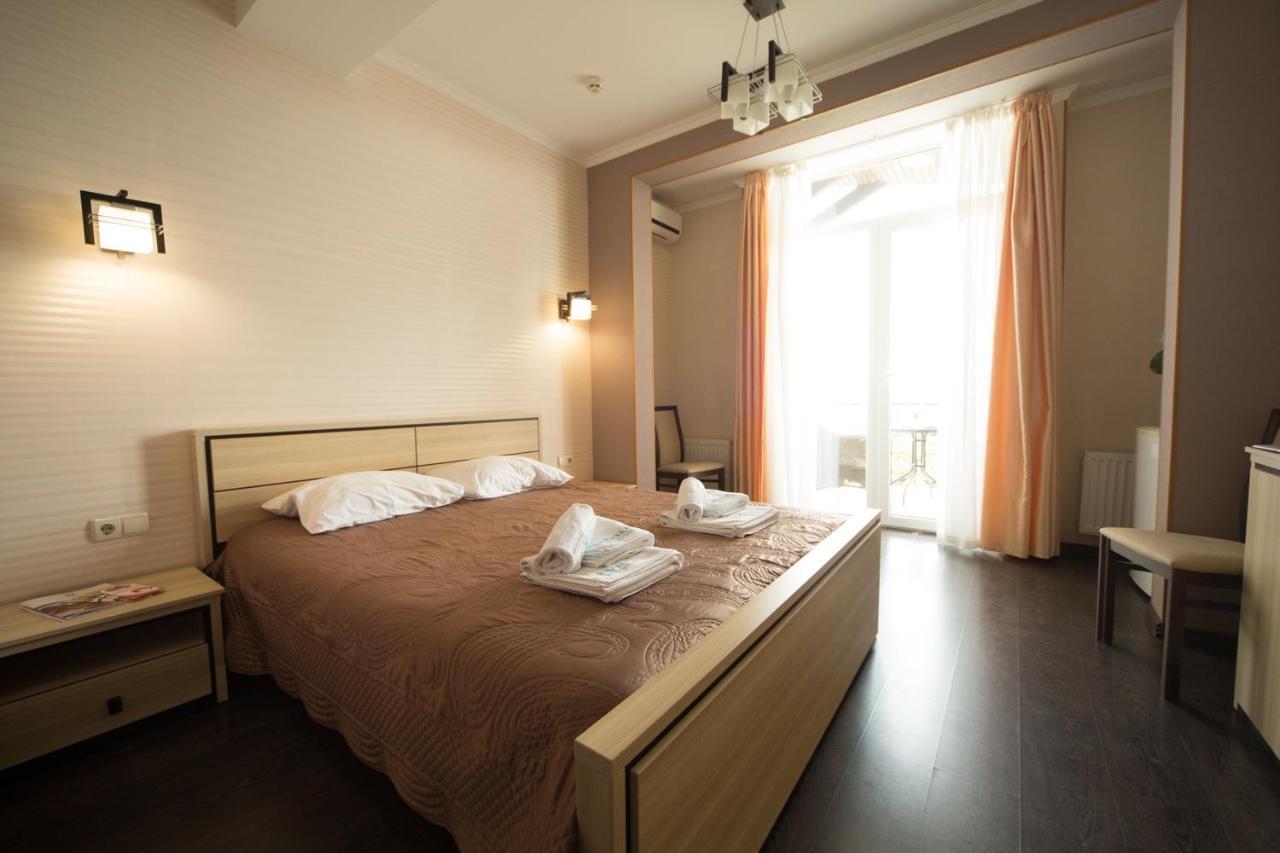 Kolyada Hotel Odessa Quarto foto