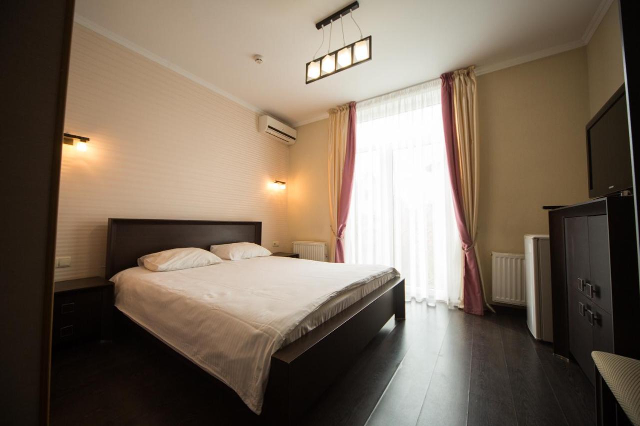 Kolyada Hotel Odessa Quarto foto